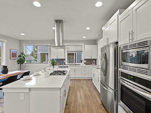 Beautiful Kitchen with stainless steel appliances - Photo is staged