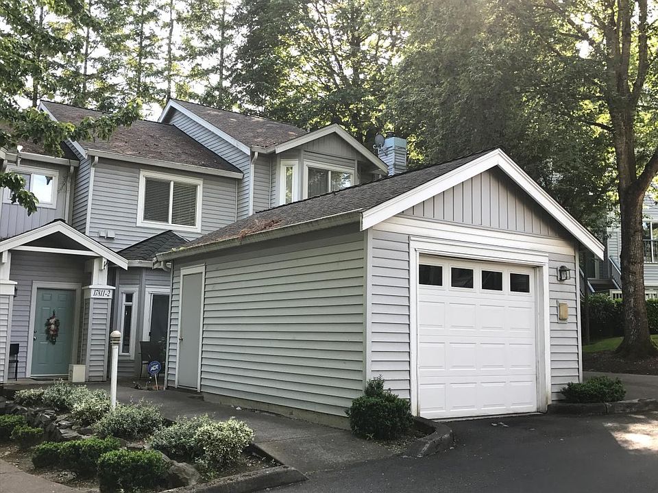 Front with covered spacious garage