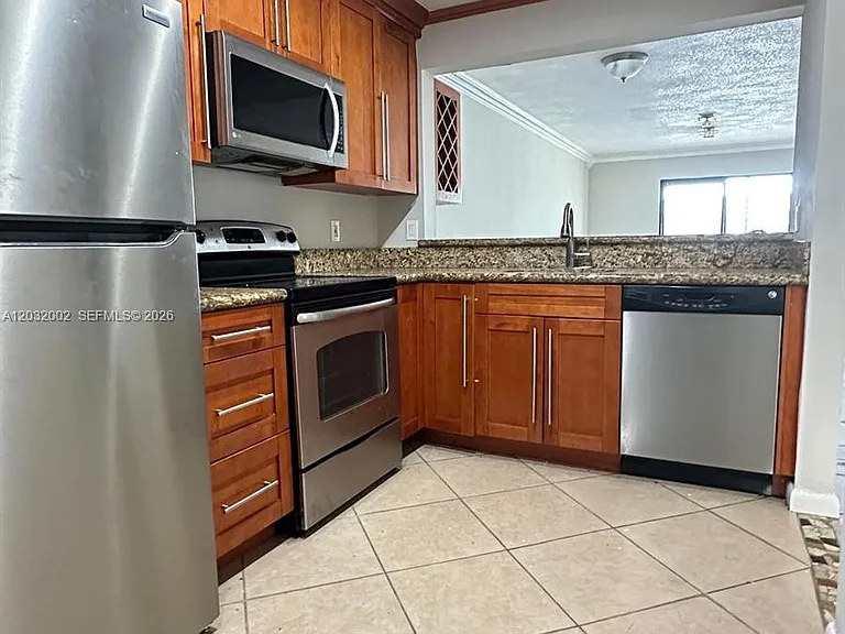 851 NE 207th Ter #6202 — Photo 1