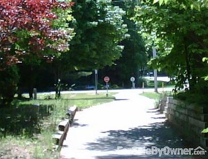 Bike Path - flat with little hills
						:
						The Bike path runs in front of the house 20 miles from Grand Haven to Holland.