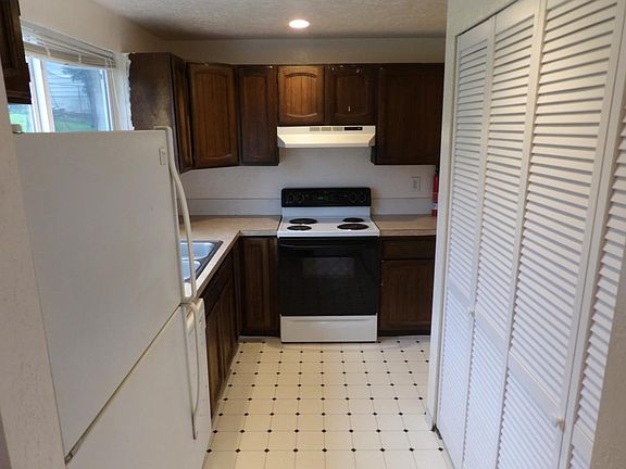 Laundry is behind bi folding doors in kitchen