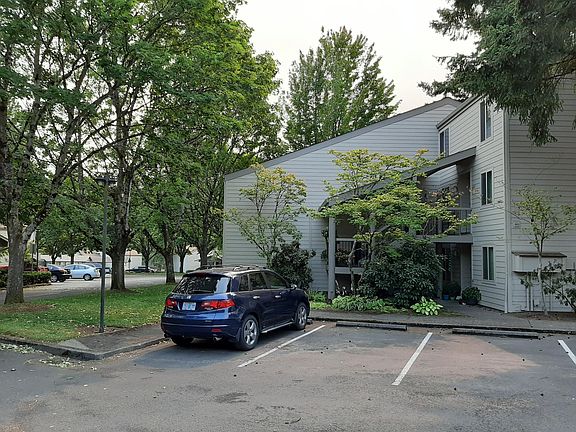 The entrance to your new home! Plenty of parking and green shade trees.