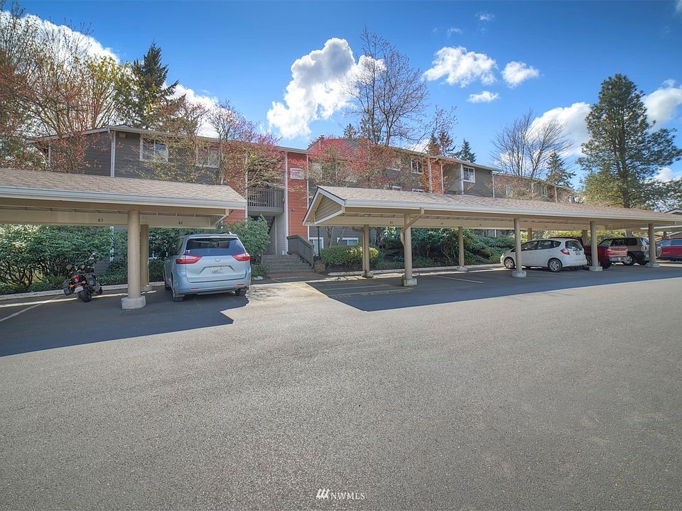 This ground floor unit comes with one covered parking space and plenty of additional parking for guests. 