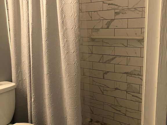 New tiled walk in shower in master bedroom
