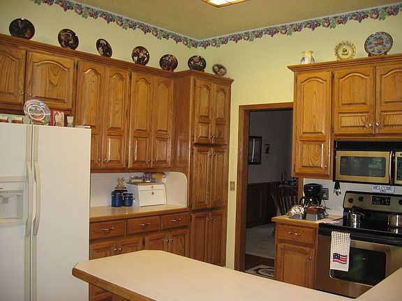 Solid oak cabinets in kitchen