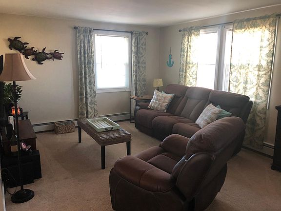 Current Living Picture. Bright and airy with new wall to wall carpeting and neutral color scheme to complement any decor.