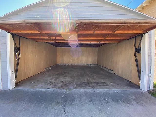 Garage will be shared between the two units. Each unit will be given tandem parking. One in the garage and one behind.