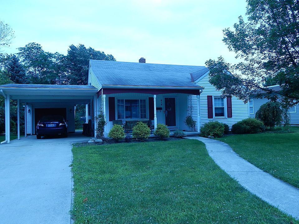 Front w/garage and carport
