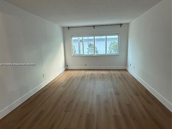 5th image of 9971 W Bay Harbor Dr APT 205