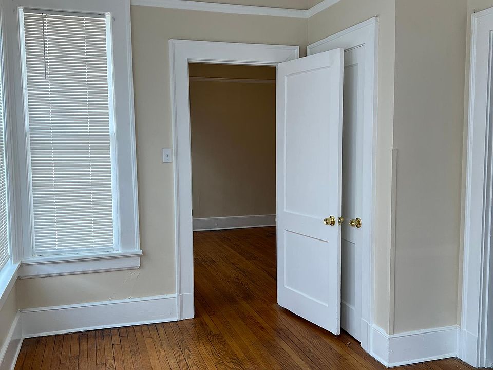 2nd Bedroom #2 view. Forward doorway leads into larger bedroom. Right doorway leads into kitchen.