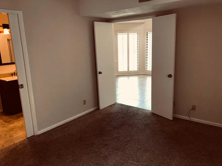 Double Door entry to guest bedroom with on-suite bathroom
