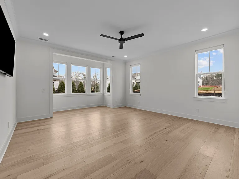 Primary bedroom with plenty of natural light