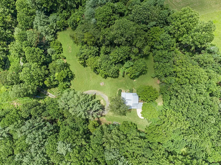 With plenty of room on the property, space for a garden, a small stream, private spring and great location, Bear Creek is an exceptional find.