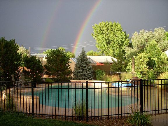 large enclosed pool with waterfalls and music