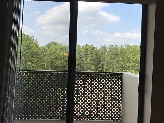 Balcony view facing Mt. Vernon Woods