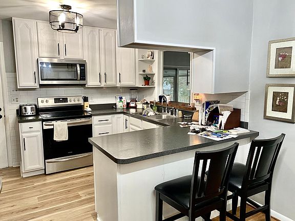 Great kitchen, nice appliances, and great light fixture