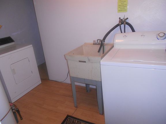 Full Laundry next to kitchen