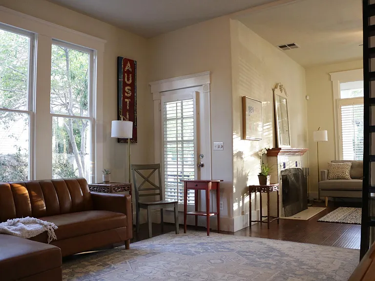 Living room, parlor with view of staircase/ladder to upstairs 3rd bedroom/loft