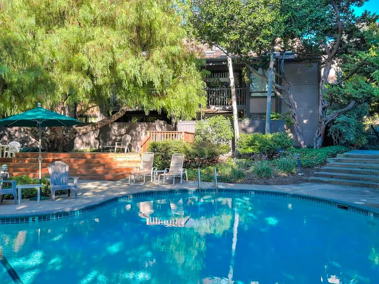 Pool area includes shady deck and patio furniture. There is also WiFi