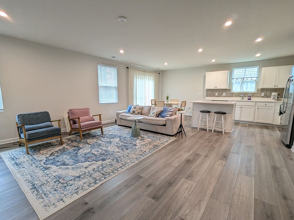 Spacious open living area (staged)