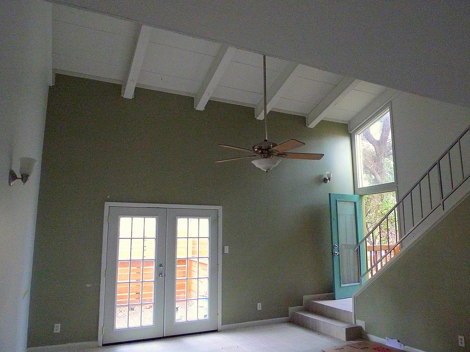 Downstairs has an open plan with vaulted ceilings.