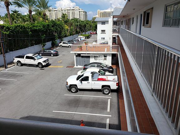 Parking area, view from unit. 1 assigned parking as well as plenty visitors parking