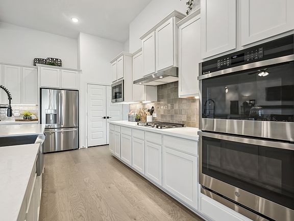 Palatial kitchen with stainless-steel appliances
