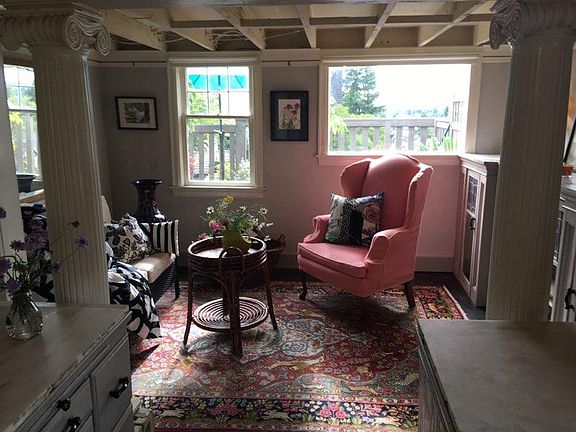 Inviting living room overlooking the lake and your garden and deck.