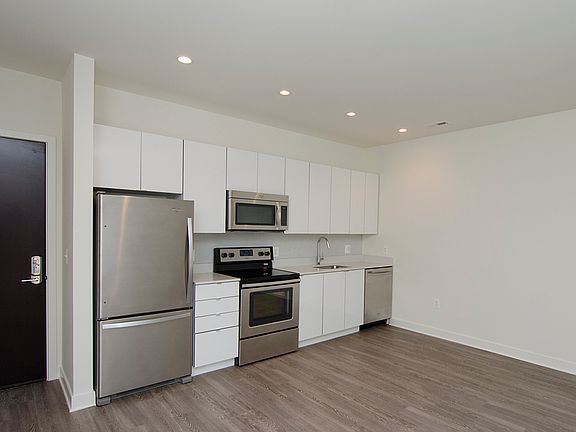 One-bedroom apartment living area and kitchen