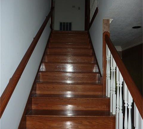 Stair case also has beautiful hardwoods