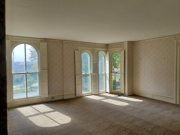 Spacious living room with floor-to-ceiling windows