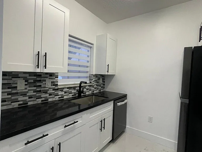 1701 NW 96th Ter #F — Photo 6