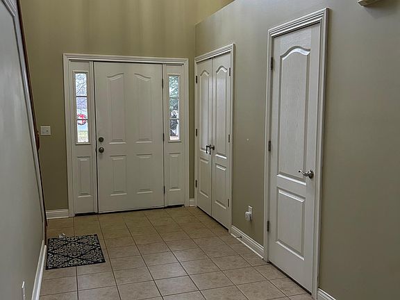 Front Hallway with vaulted ceiling