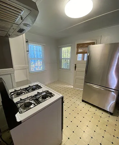 Kitchen, Large Stainless Refrigerator, Gas Stove, ample cabinet storage
(this photo does not reflect New Flooring)