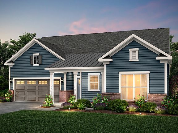 Bridgestone Exterior LC2G features siding, brick accents and covered front porch
