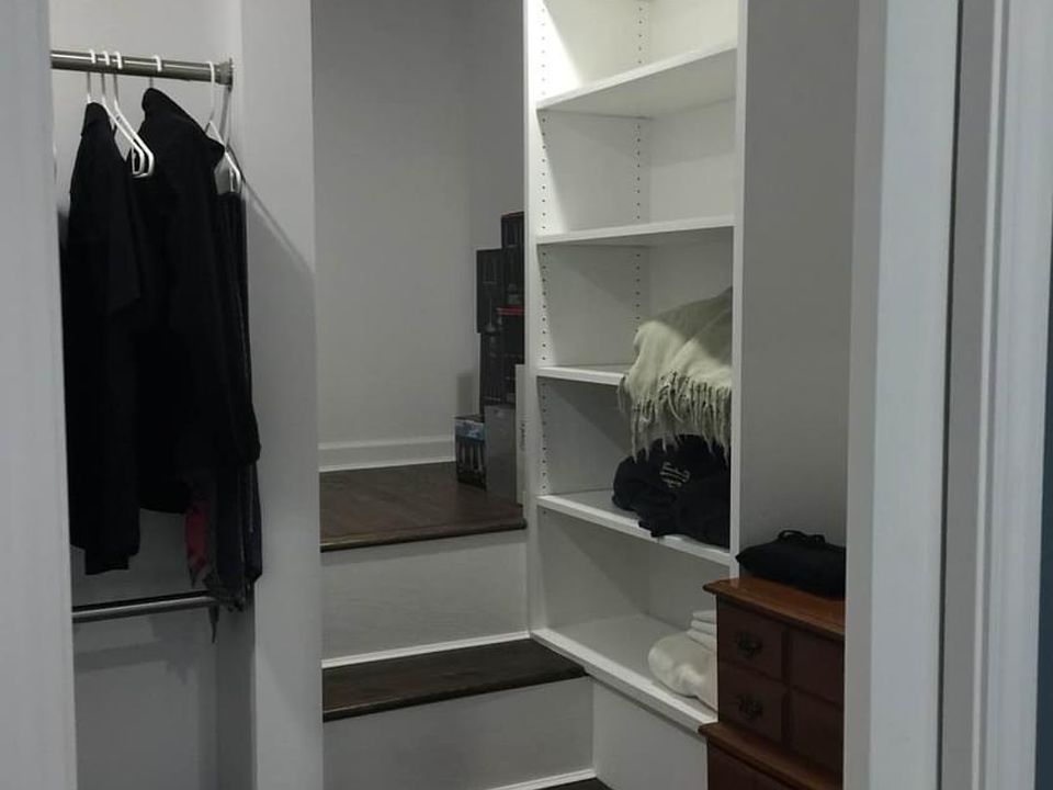 Walk in closet with lots of extra storage