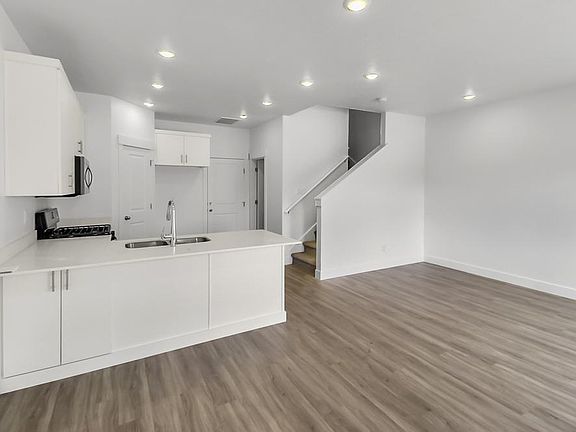 Kitchen, Dining, Great Room. Photos as of 4-15-2023