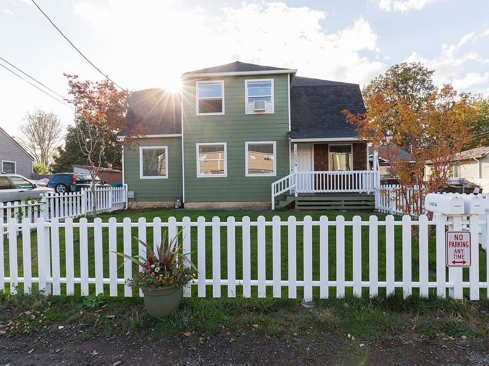 Curb side of the duplex. The lawn pictured is the lawn for the unit for rent. This photo is about two years old and now the yard has more coverage with a couple of honey suckle plants and other planters and plants as well.