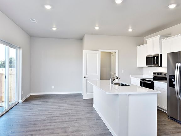 A spacious kitchen island is the perfect space for meal preparation.