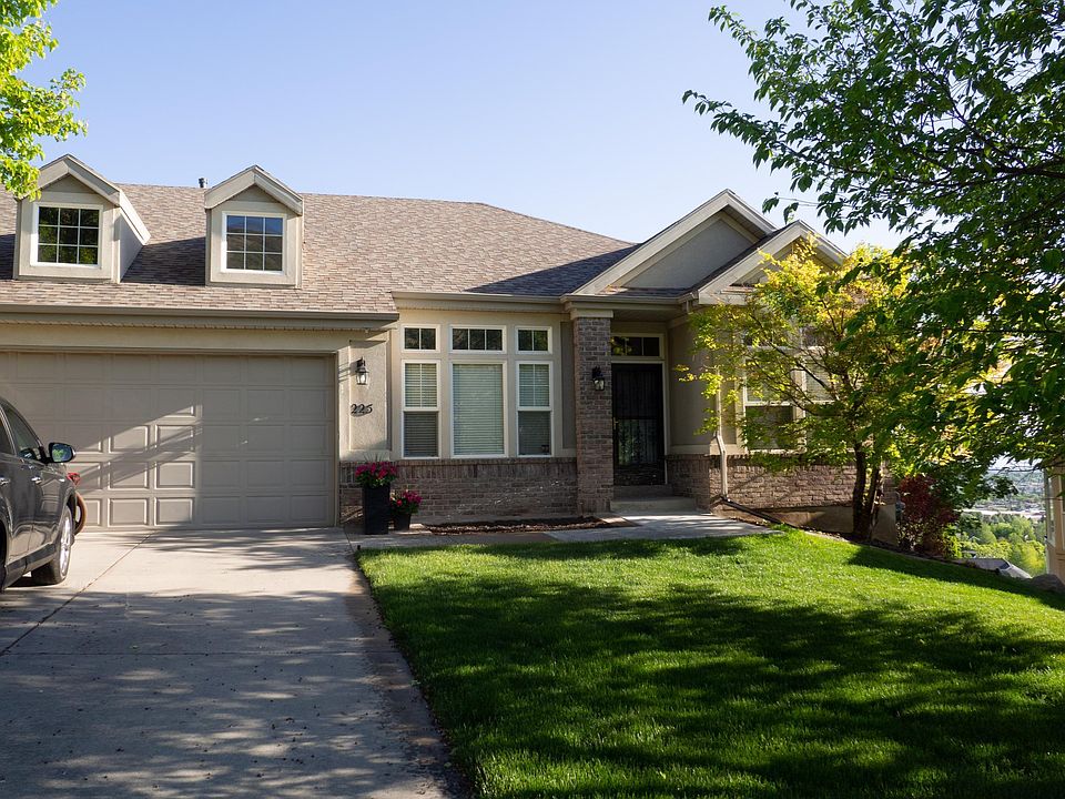 Double driveway and garage along with front lawn you don't have to mow or maintain.