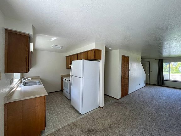 Photos taken prior to installation of new flooring. Carpet has since been replaced.