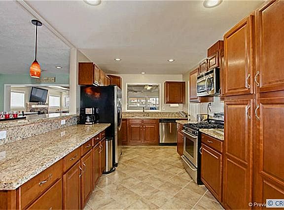 5th image of 10051 Holder St