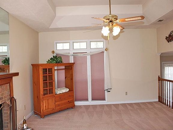 The many windows provide lots of natural light in the family room.