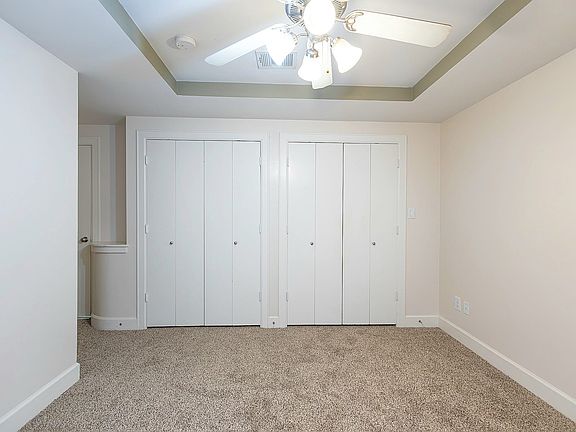 1st Floor bedroom, view from patio to closets.