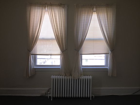 Living room windows facing Porter Street