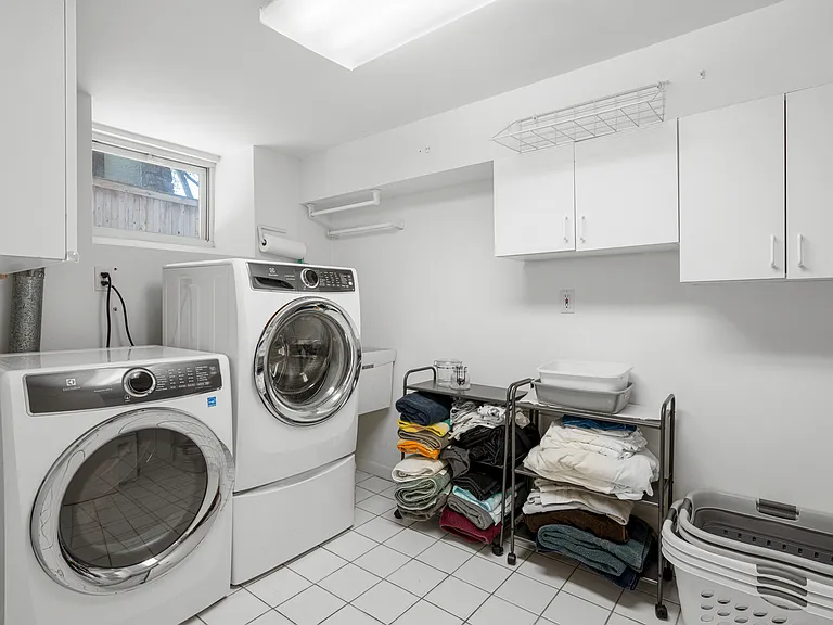 Convenient laundry steps down from kitchen