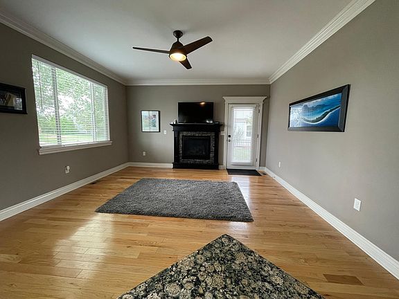Hardwood floors in the main living areas on the main floor. Gas fireplace in the living room.