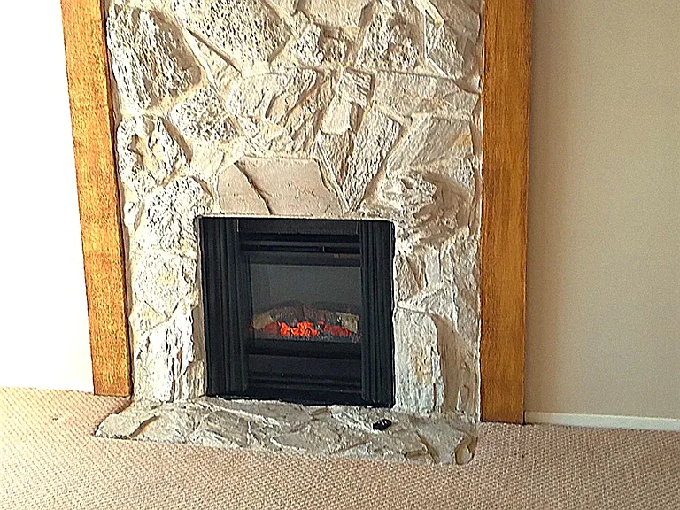 Electric fireplace with heat