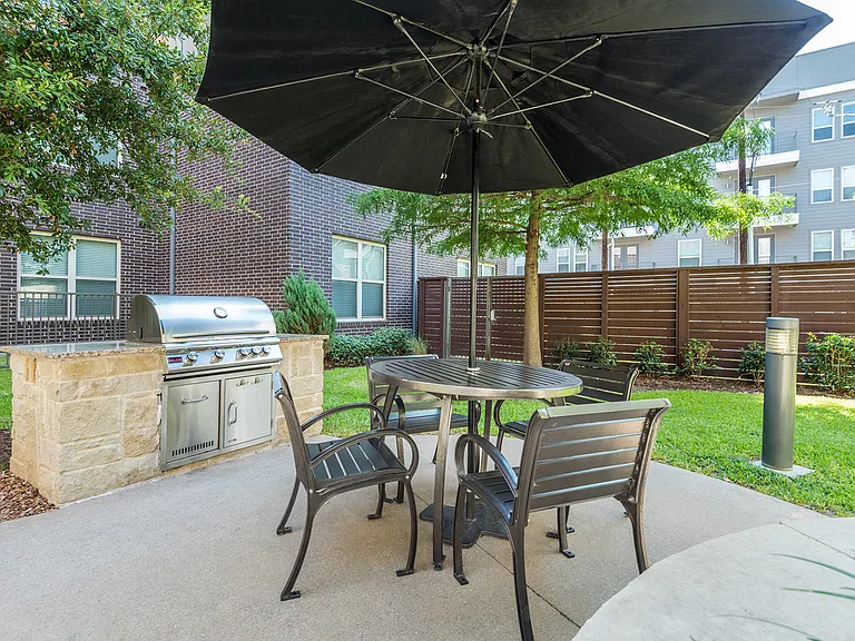 Outdoor grilling station with seating