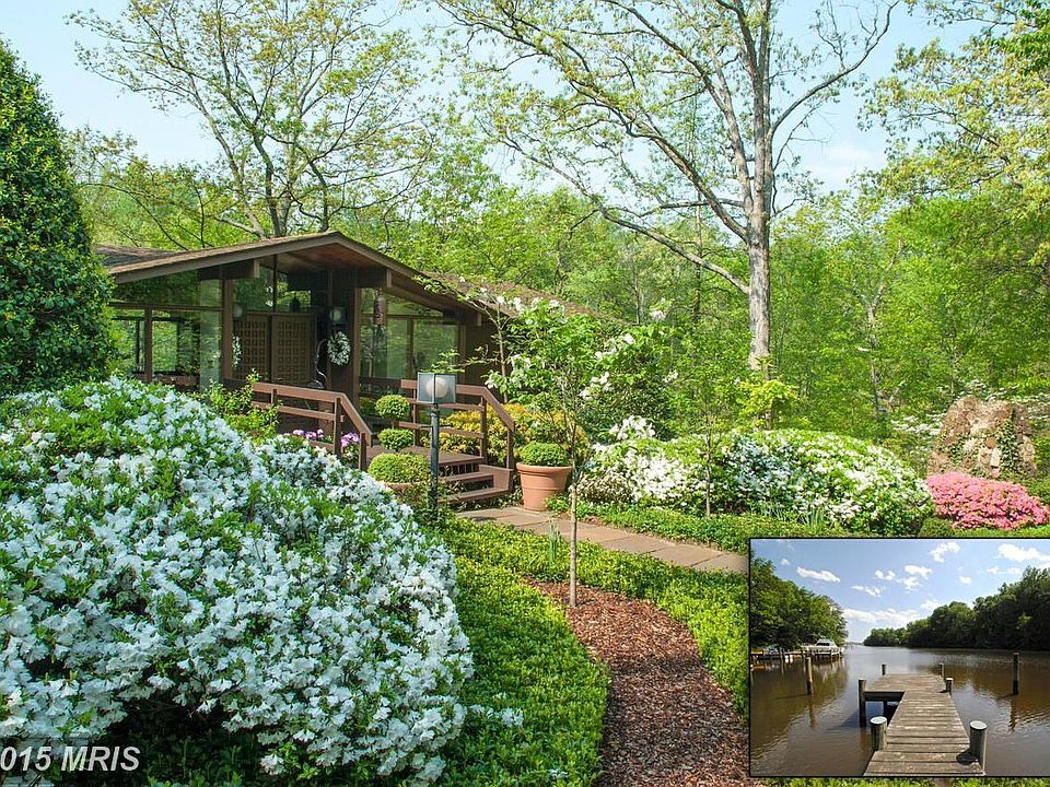 Enchanting Waterfront setting on 1.23 acres